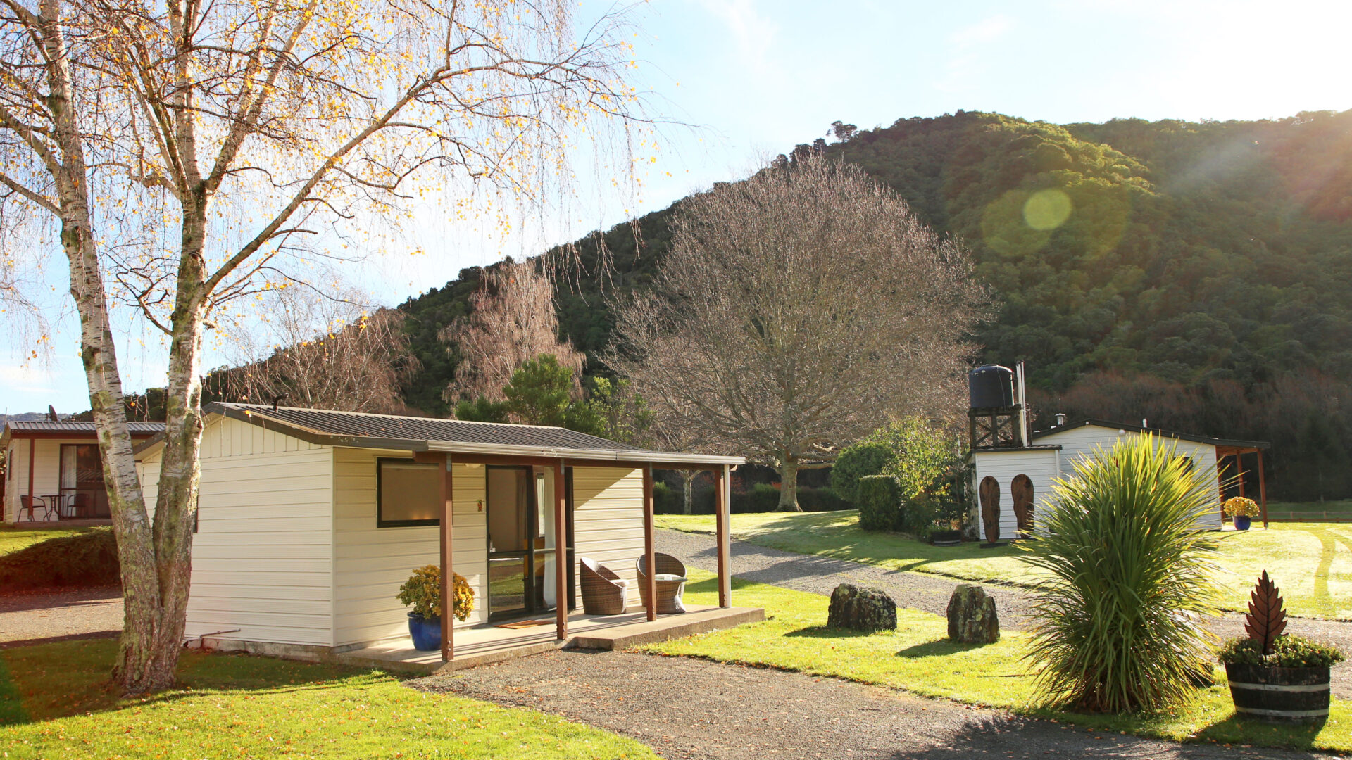 Picton TOP 10 Holiday Park Studio exterior Exterior shot of Studio at Picton TOP 10 Holiday Park with forested hills of Victoria Domain behind.